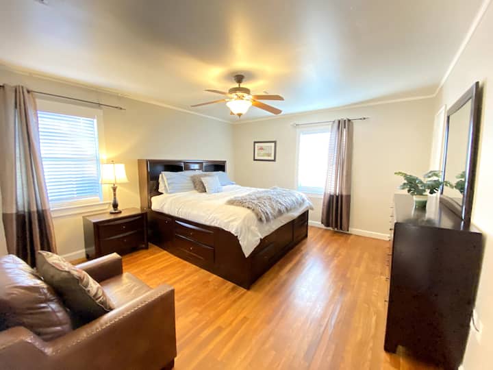 King size bed, plenty of natural light, & space to make you feel at home!