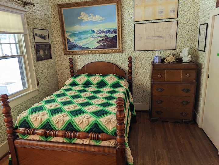 You might catch this amazing vintage hand-crocheted beadspread(complete with fringe) in use.