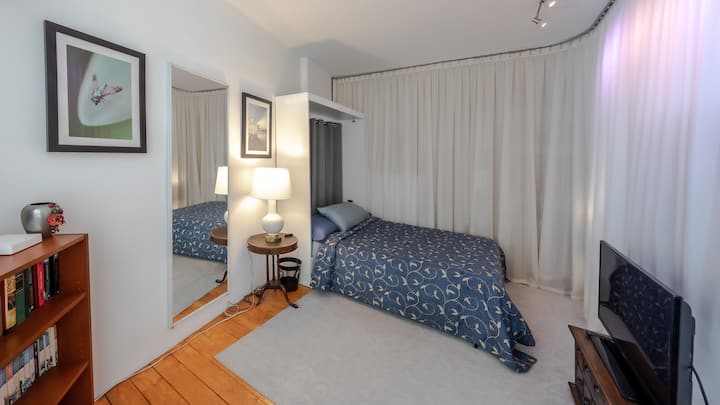 Bedroom with queen-size, semi-firm, memory foam mattress. 