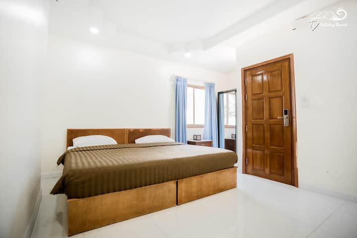 Dormitorio   : cama tamaño king.