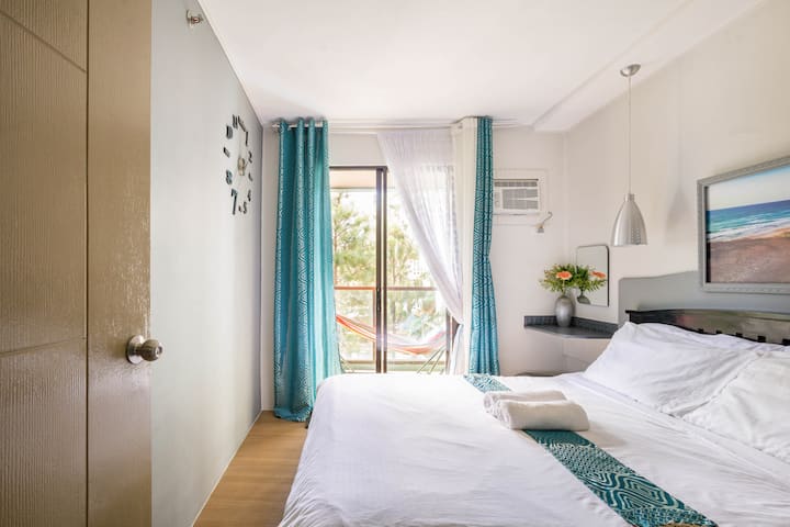 bedroom 1 with access to balcony