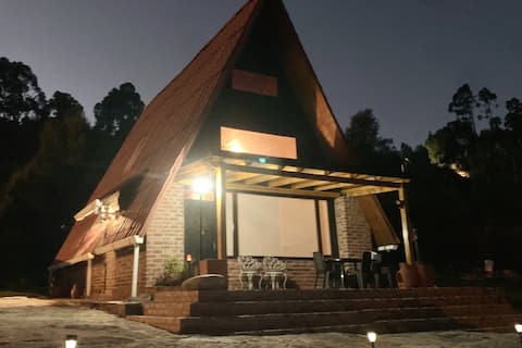 Popular Airbnb listing: Wood cabin with a view of the Lake. in Paipa