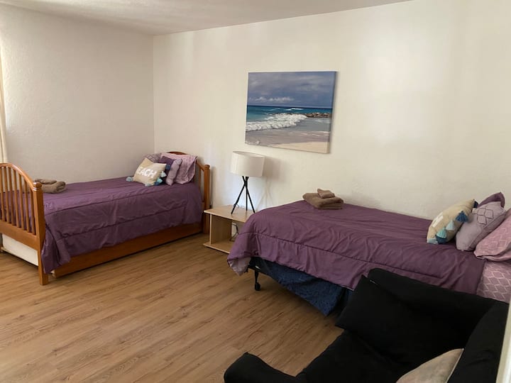 The middle bedroom is great for the kids with a trundle, a twin and a futon couch, perfect for a little one!