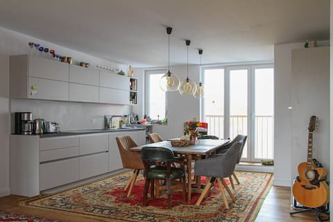 Popular Airbnb listing: 120 sqm2 penthouse/attic apartment + sauna + fireplace in Rummelsburg