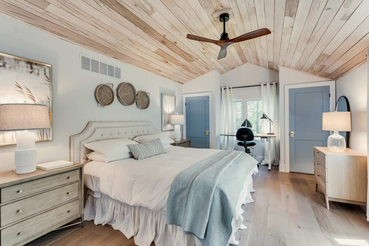 second bedroom upper level with king bed and work station