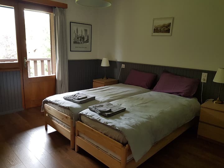 Habitación del primer piso 3 camas en terraza privada