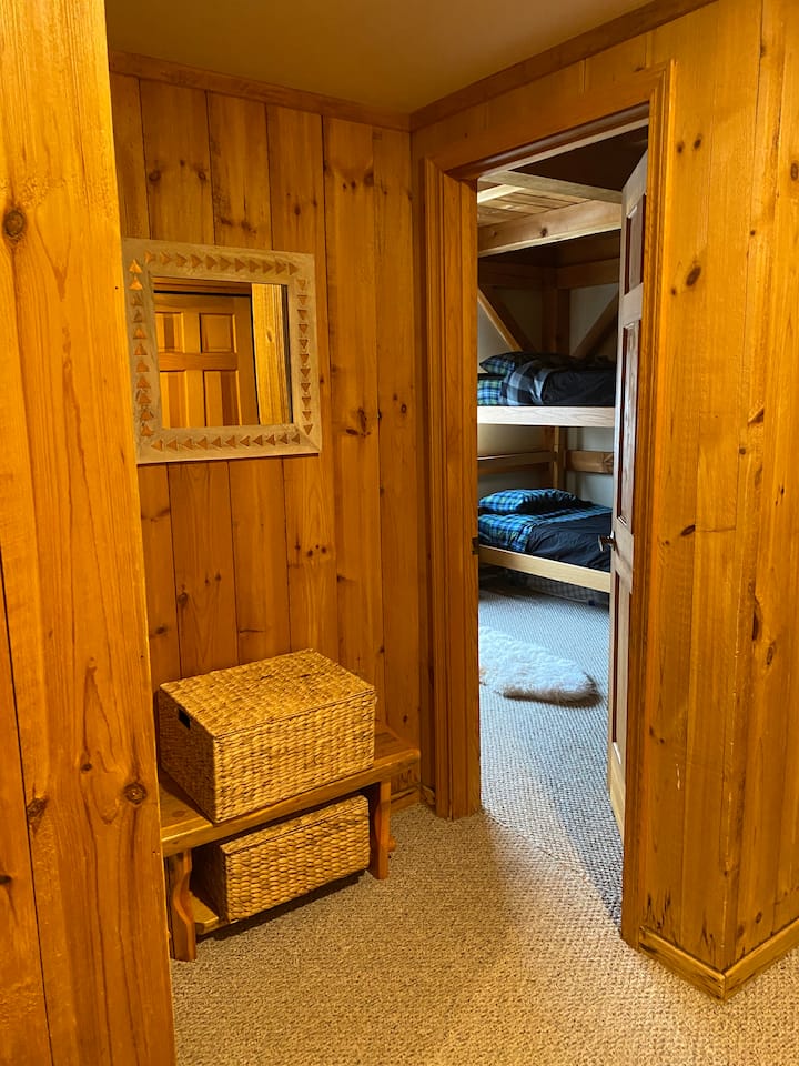 Little alcove between the first two bedrooms. Bunk room with 4 twins on right. 