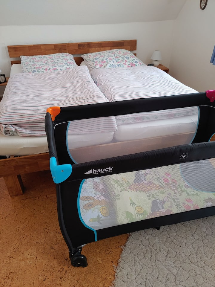Bedroom 1 with double bed and cot for up to 3 years