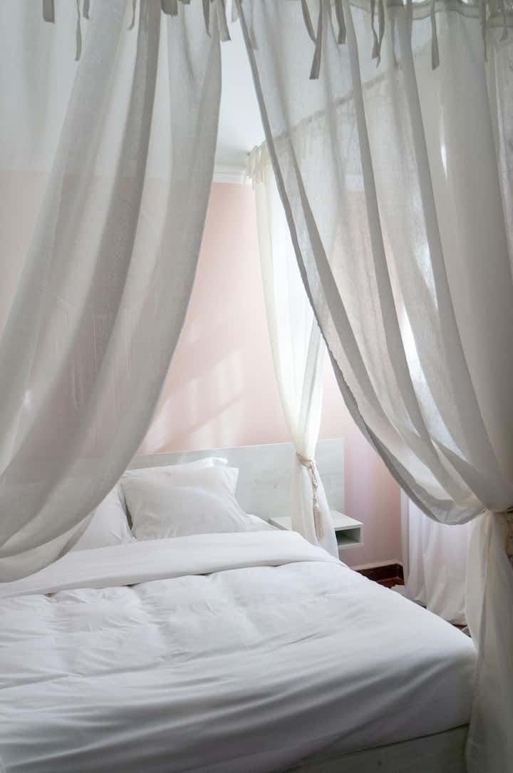 Letto a quattro piazze