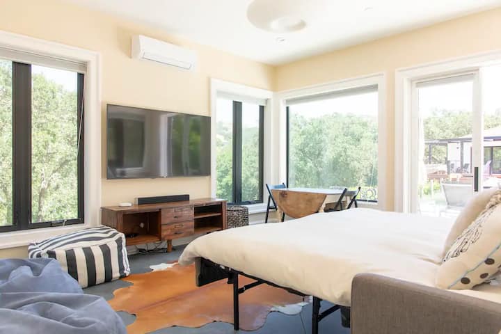 The pool house will become the most cherished bedroom. A private resort in the private resort with a king bed, TV, large ensuite bath, eating nook and fantastic views of the pool and Napa mountains. 