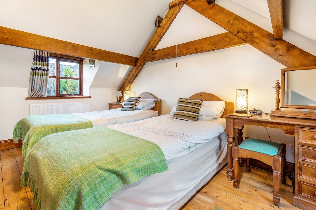 The second bedroom - these beds are usually together making a super king-size!
The room also has a TV with Sky box and a hand basin.