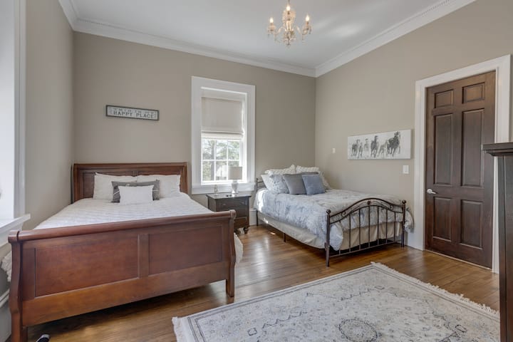 Downstairs master with 2 queen beds. Private bath attached.