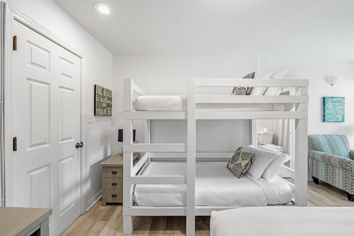 Bunk room features twin over twin bunk and a queen bed. This room also has its own dedicated bathroom.