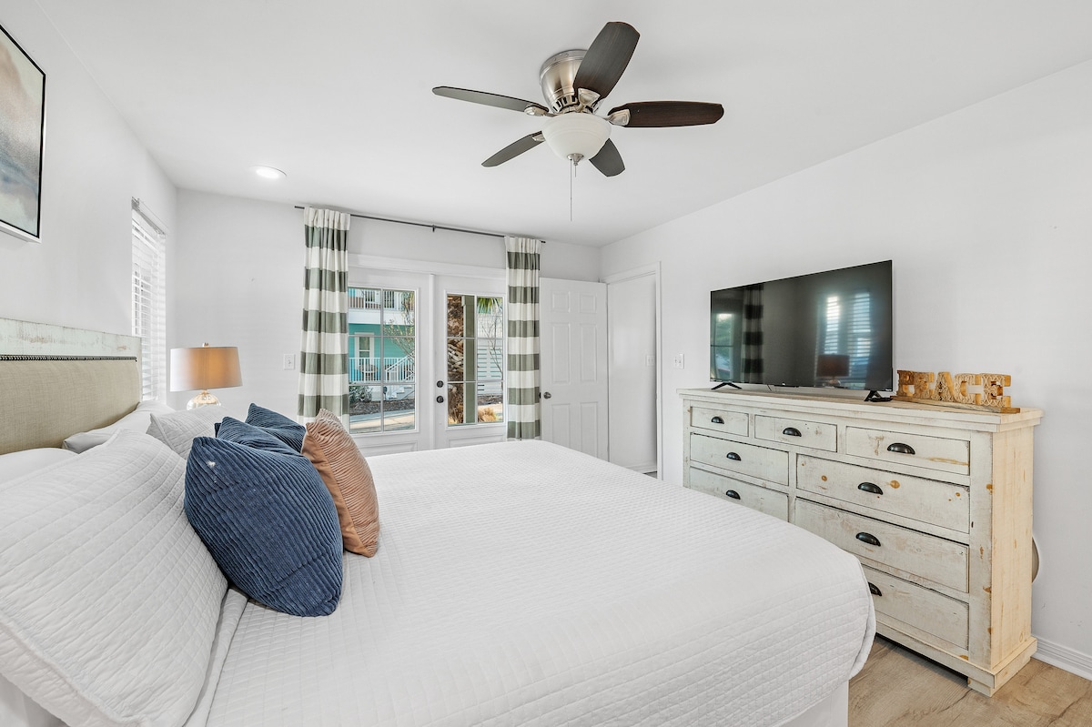 Second King bedroom opens up to the first floor wrap around porch.