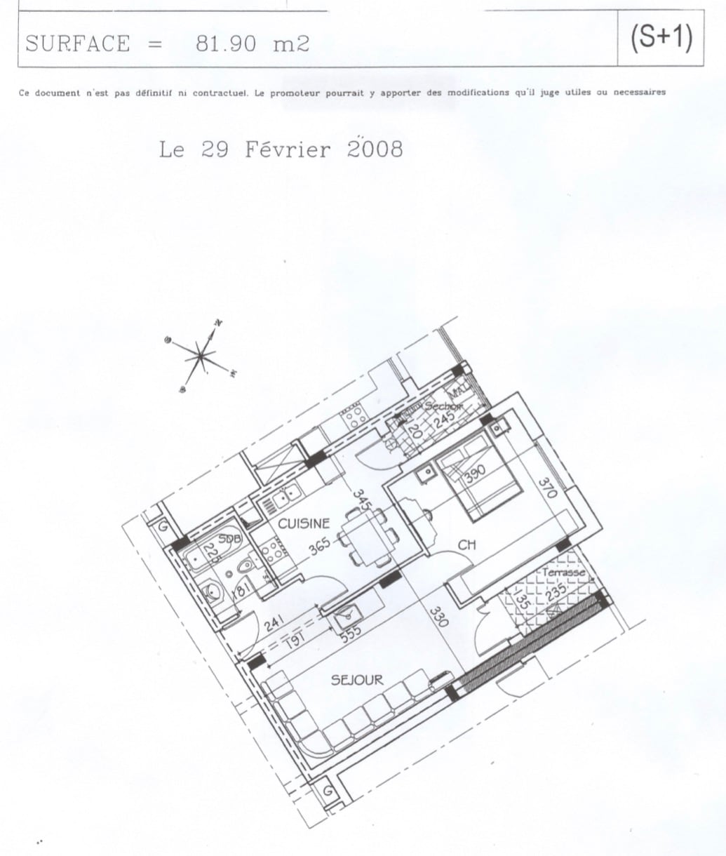 A floor plan layout is presented, detailing the arrangement of rooms within the space. The labeled areas include a kitchen, living room, bedroom, and bathroom, showcasing a functional design that maximizes the available area.