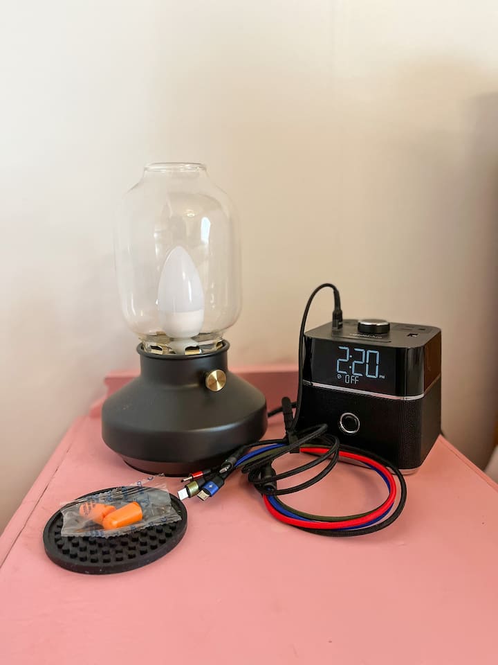 universal phone charger as well as bluetooth alarm clocks in full and king bedroom 