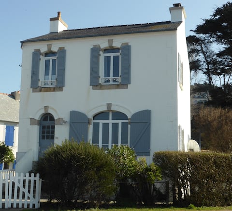 Charming house, right by the water.