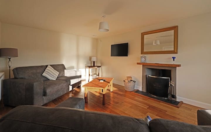 Cosy lounge with double sofa bed.