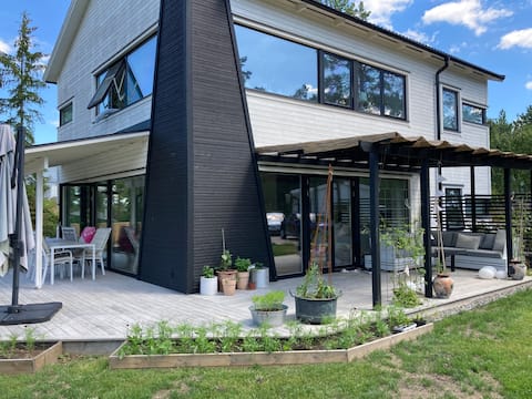 House in the archipelago next to the sea with pool