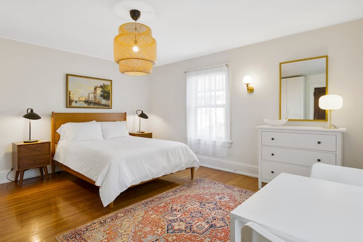 Bedroom 2 offers comfortable queen size bed, dresser and mirror, shift robe with hangers and drawers, iron and ironing board, luggage rack, towel rack, table and chairs.  Bedroom 2 shares a Jack-n-Jill bathroom with Bedroom 3.  Ideal for families.