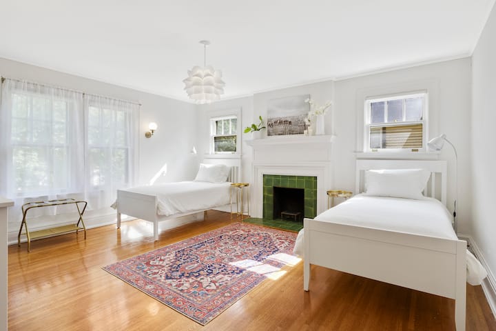 Bedroom 3 offers 2 comfortable twin size beds, dresser with mirror, walk in closet with hangers, iron and ironing board, luggage rack and towel rack.  Bedroom 3 shares a Jack-n-Jill bathroom with Bedroom 2.