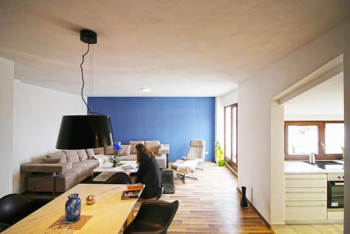 Blue apartment over Prizren roofs