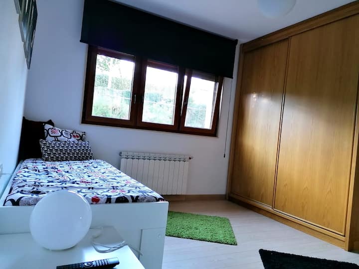 Room with 2 single nest beds where they can sleep up to 4 pax. and 32"TV.