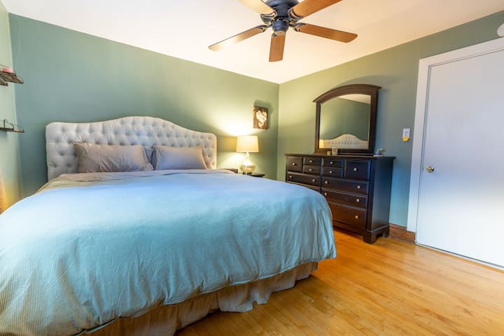 Primary bedroom with dual adjustable king bed