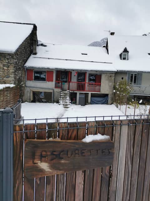 House at the foot of the mountains