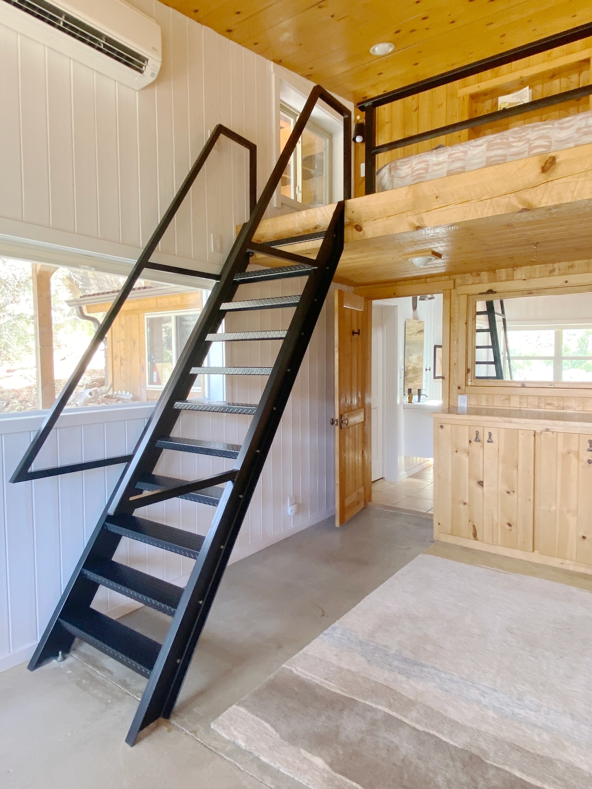 Stairs to the sleeping loft.