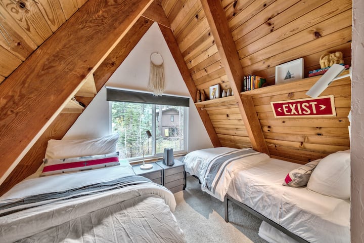Lofted sleeping area with two twin beds