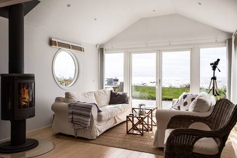 A fantastic and unique beachfront house by the sea