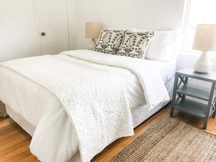 This bedroom has a comfortable full size bed.