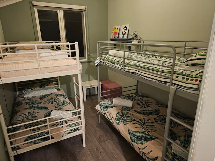Bedroom 4 - Two sets of bunk beds with adjoining kids play space