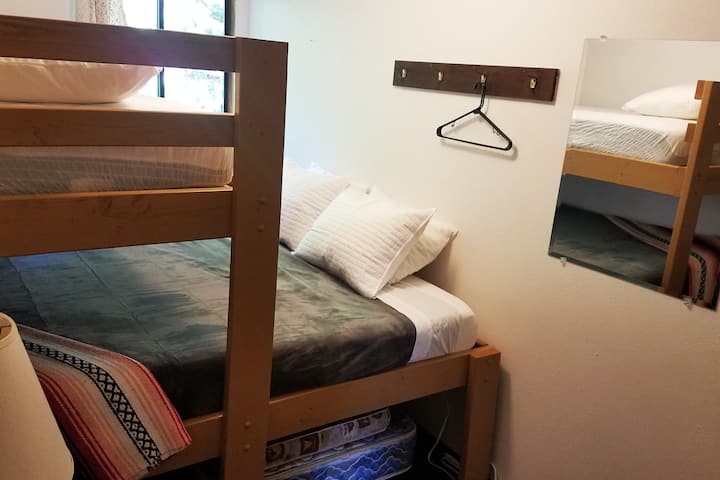 Room 17, One King Bed and one twin. Set up as a bunk bed.