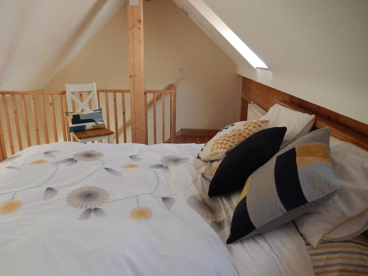 Escaleras que conducen a la recámara.