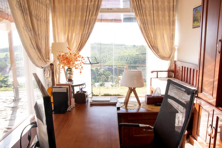 2nd bedroom with work station, romanticized by 2 sided glasswalls overlooking valley and lake, reserved for creative guests
