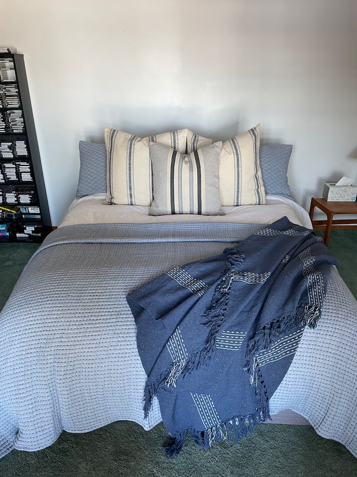 Lower level bedroom with queen bed