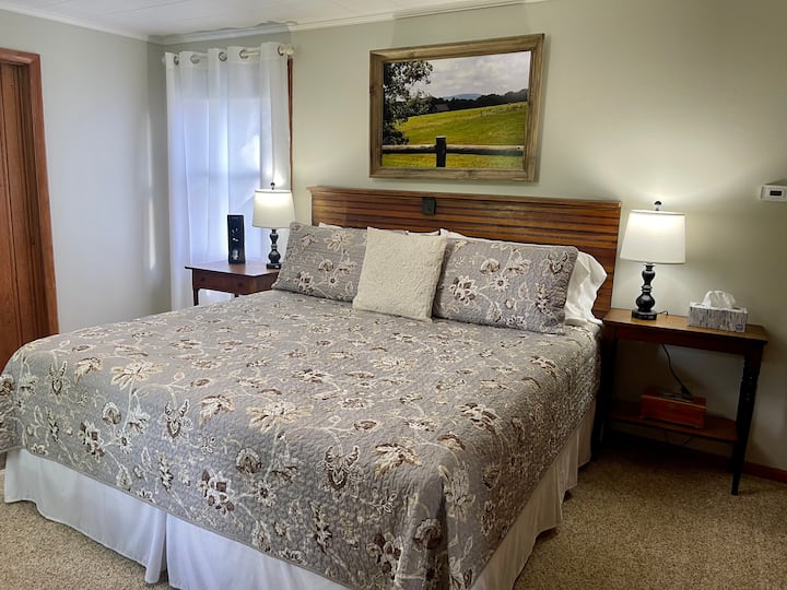 Master bedroom King Bed (quilts and blankets may vary with the season)