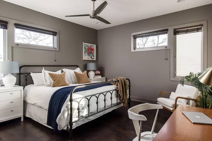 The first Master Suite, features a plush King bed and direct access to private bath..