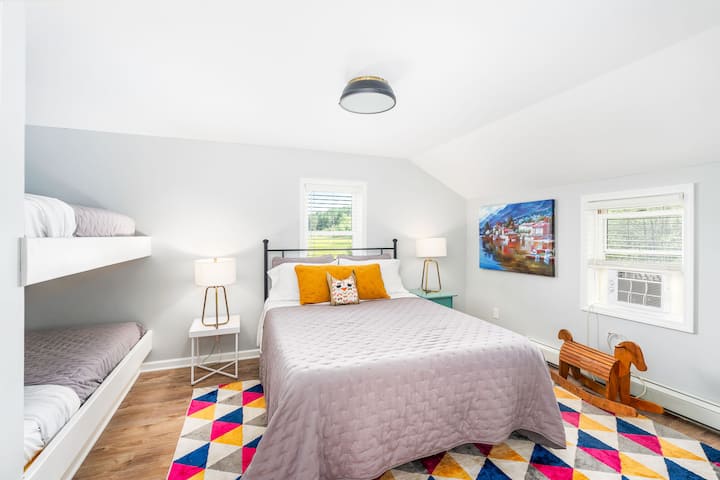 The Juniper Room has a Queen bed and built in twin-sized bunk beds. Note the window air conditioner & fan to ensure you have a pleasant stay! 