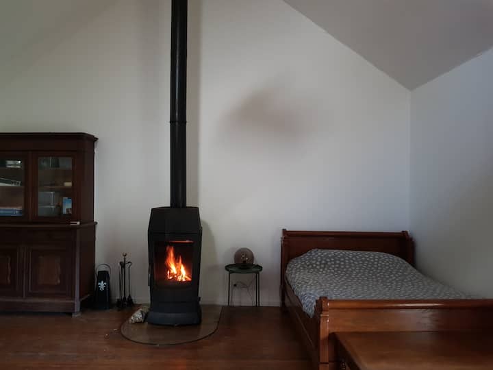 Bedroom 1, in the warmth of the wood burning stove