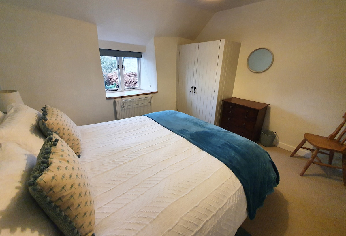 The second bedroom has a King size bed, fitted wardrobe and small chest of drawers.