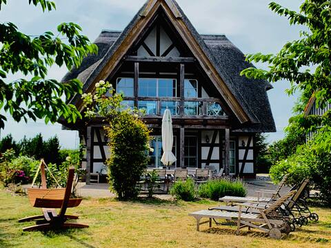 Landhaus am Achterwasser with sauna & fireplace