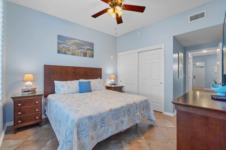 Sea inspired, Large Second Master Suite with King Bed.  60" Smart Flat Screen TV, Bahama Shutters and large Closet.