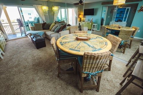 Popular Airbnb listing: Sand Surf & Sunset Ocean View Condo - 2 Bed 2 Baths in Caswell Beach