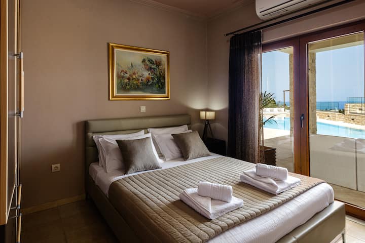 Guest house bedroom with direct pool access.