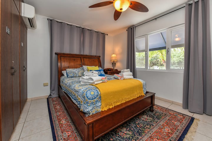 street side queen bedroom with ensuite bath