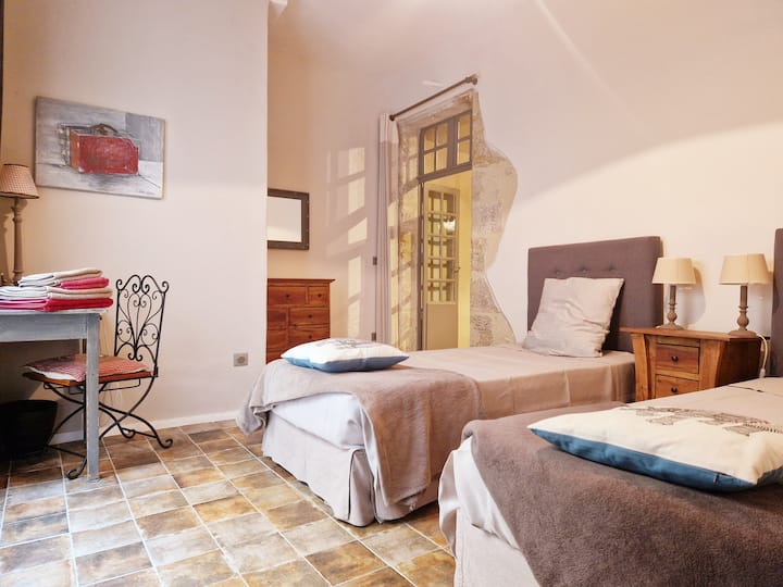 Two single beds + a desk for tele-workers
