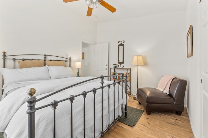 Deliciously cool queen-sized bedroom, blackout drapes.